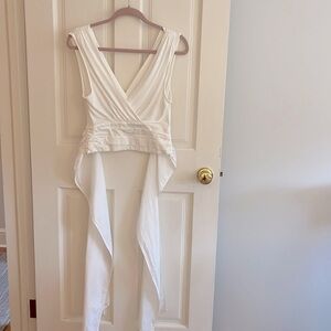 Vneck sleeveless wrap tie blouse.